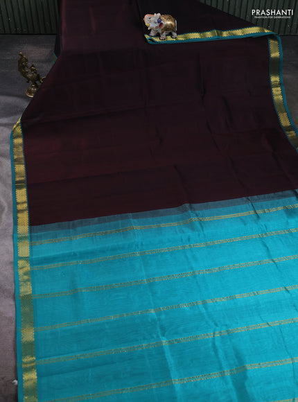 Silk cotton saree coffee brown and teal green with plain body and zari woven border