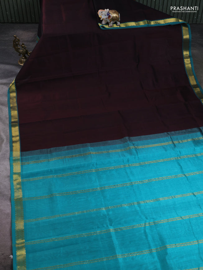 Silk cotton saree coffee brown and teal green with plain body and zari woven border