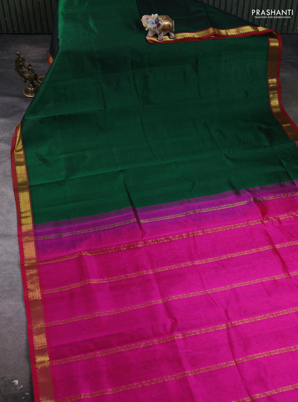 Silk cotton saree green and pink with plain body and zari woven border