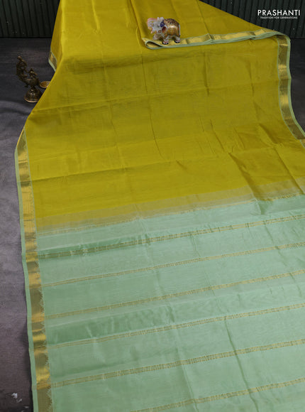 Silk cotton saree lime yellow and pista green with plain body and zari woven border