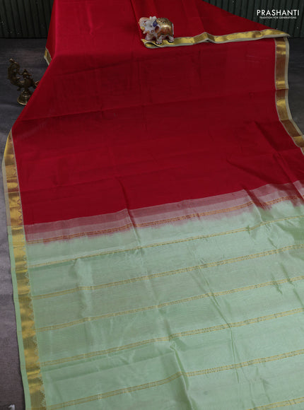 Silk cotton saree red and pista green with plain body and zari woven border