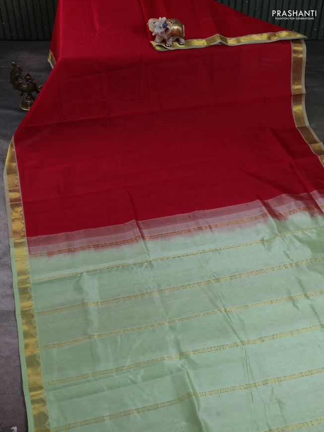 Silk cotton saree red and pista green with plain body and zari woven border