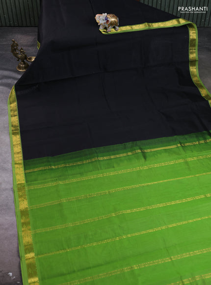 Silk cotton saree black and green with plain body and zari woven border