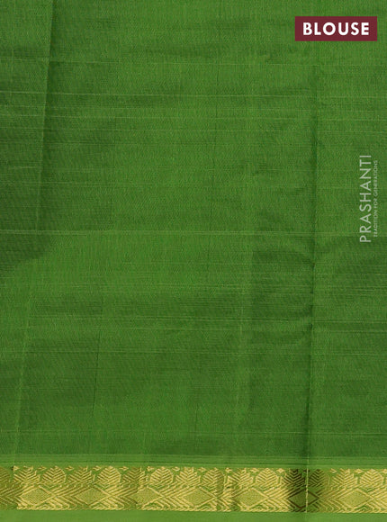 Silk cotton saree black and green with plain body and zari woven border