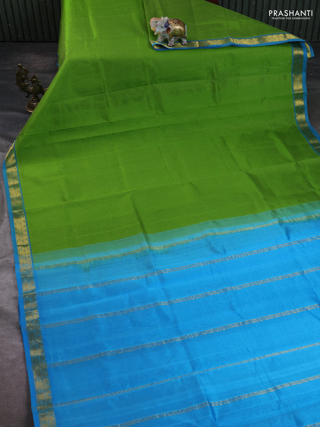 Silk cotton saree light green and cs blue with plain body and zari woven border