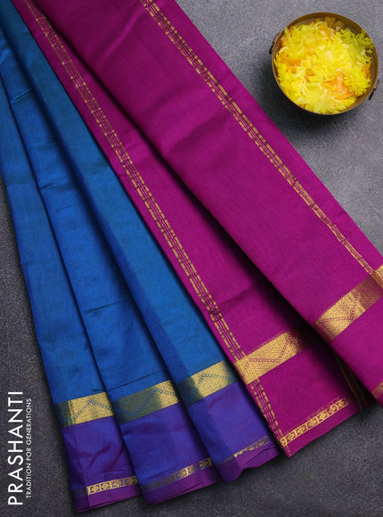 Silk cotton saree teal blue and purple with plain body and zari woven border