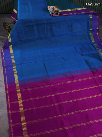 Silk cotton saree teal blue and purple with plain body and zari woven border