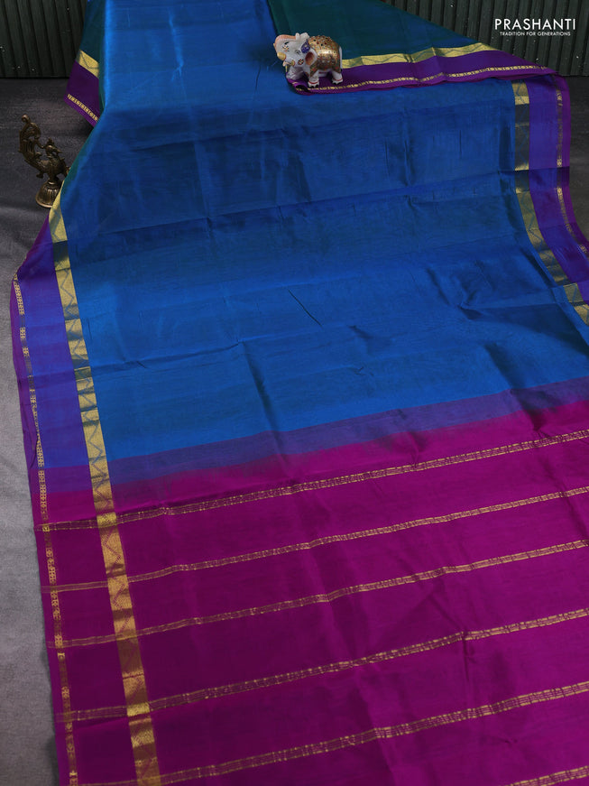 Silk cotton saree teal blue and purple with plain body and zari woven border