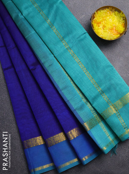 Silk cotton saree blue and teal green with plain body and zari woven border