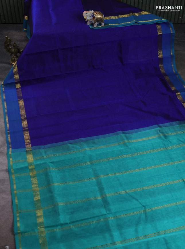 Silk cotton saree blue and teal green with plain body and zari woven border