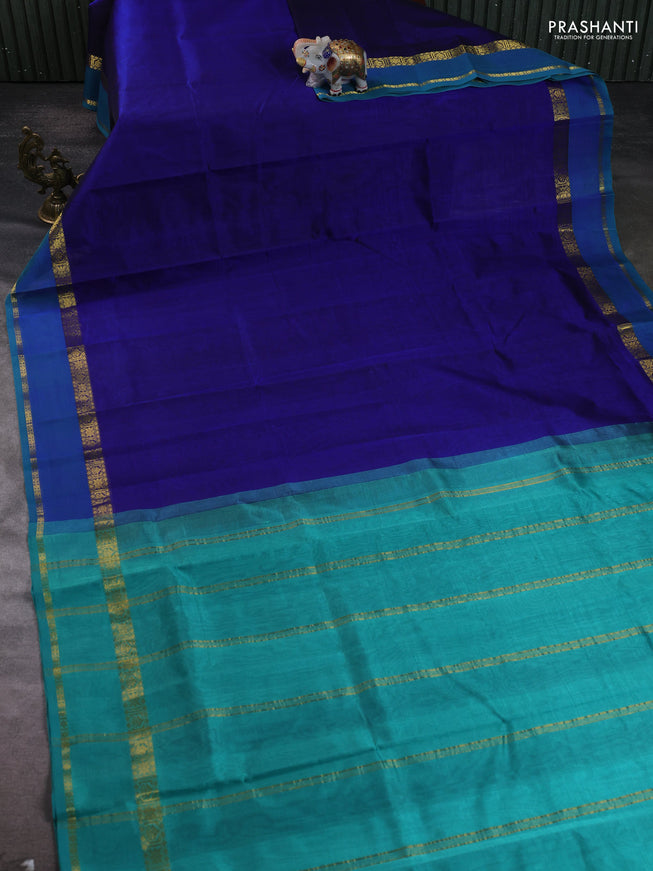Silk cotton saree blue and teal green with plain body and zari woven border