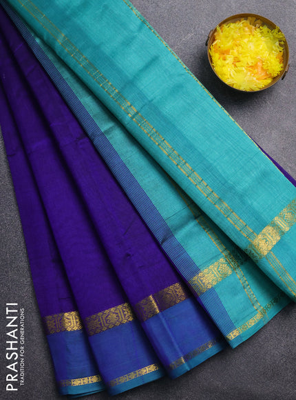 Silk cotton saree dark blue and teal green with plain body and rettapet zari woven border