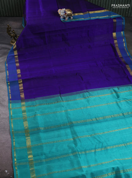 Silk cotton saree dark blue and teal green with plain body and rettapet zari woven border