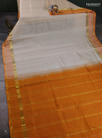 Silk cotton saree cream and mango yellow with plain body and rettapet zari woven border