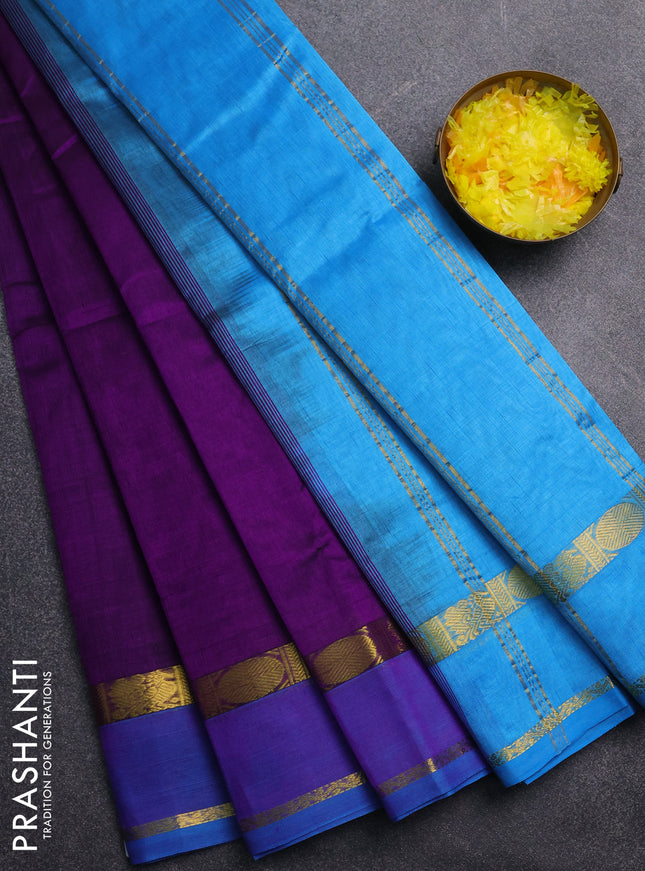 Silk cotton saree deep purple and cs blue with plain body and rettapet zari woven border