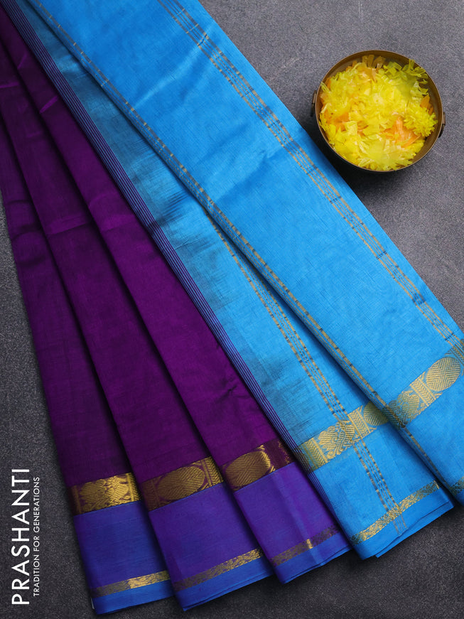 Silk cotton saree deep purple and cs blue with plain body and rettapet zari woven border