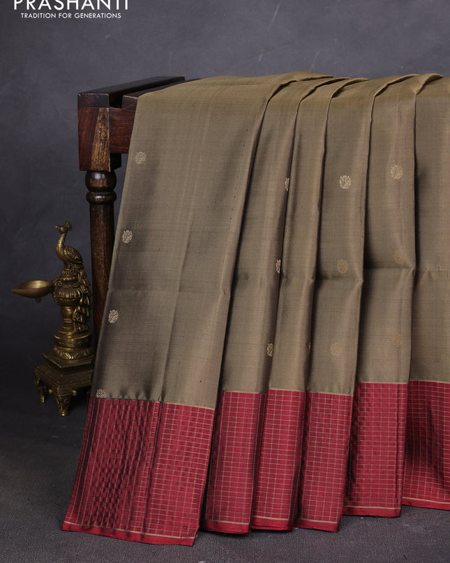 Pure soft silk saree elaichi green and maroon with woven buttas and zari checked border