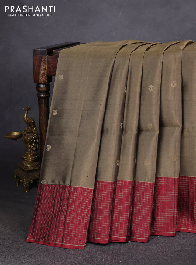 Pure soft silk saree elaichi green and maroon with woven buttas and zari checked border
