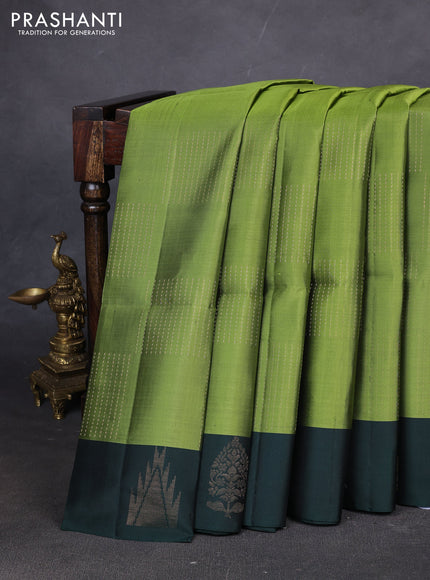 Pure soft silk saree light green and dark green with allover zari weaves and temple design butta border