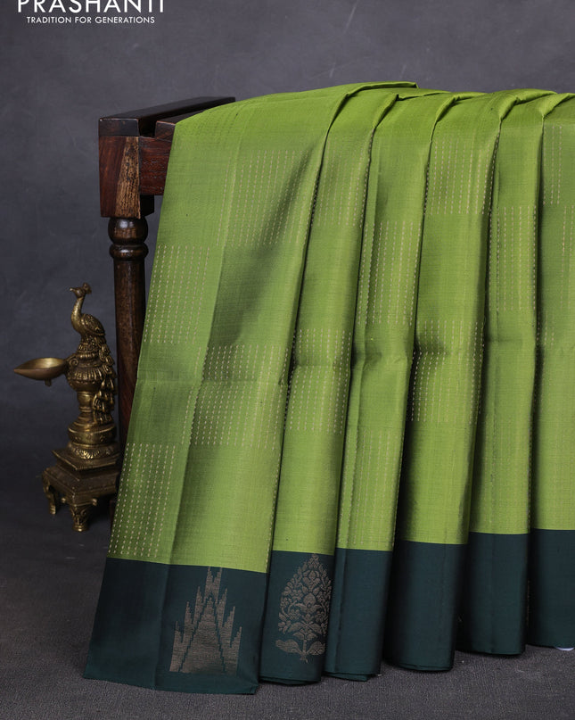 Pure soft silk saree light green and dark green with allover zari weaves and temple design butta border