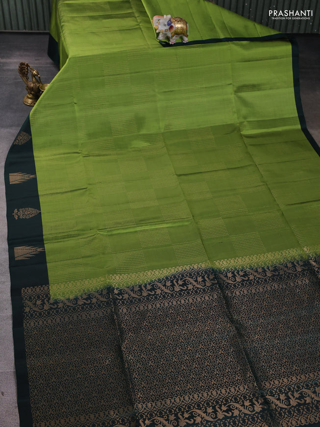Pure soft silk saree light green and dark green with allover zari weaves and temple design butta border
