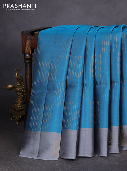 Pure soft silk saree cs blue and grey with allover zari weaves and temple design butta border