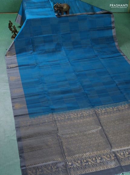 Pure soft silk saree cs blue and grey with allover zari weaves and temple design butta border