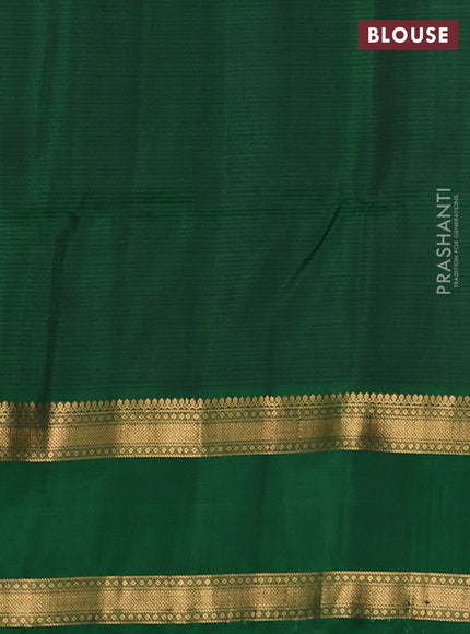 Pure soft silk saree dual shade of pinkish orange and green with allover zari weaves and rettapet zari woven border