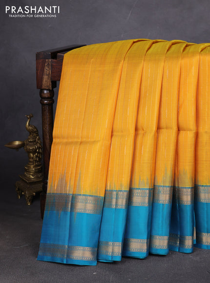 Pure soft silk saree mustard yellow and teal blue with allover zari weaves and rettapet zari woven border
