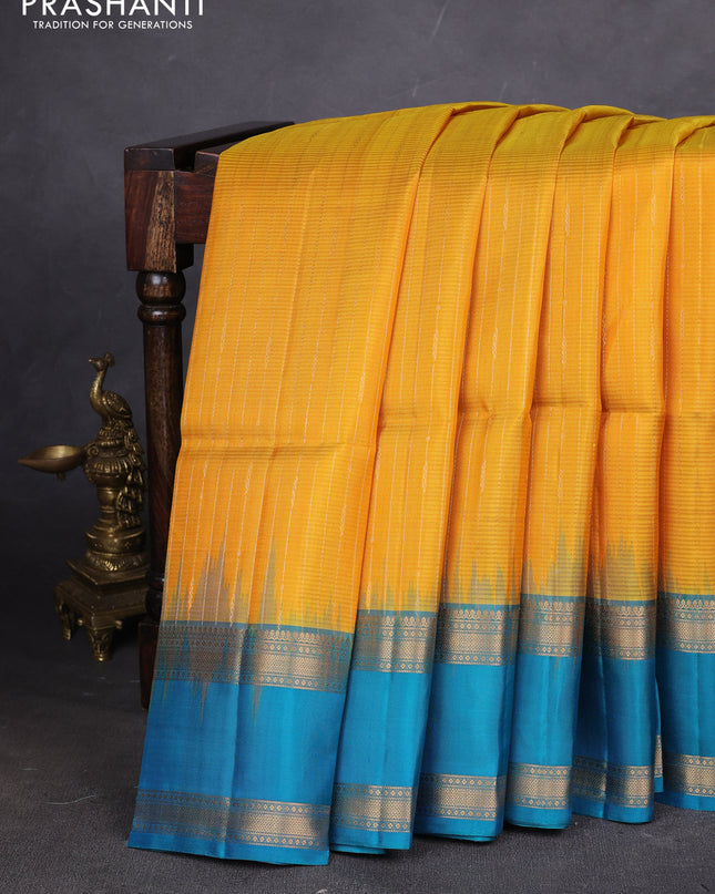 Pure soft silk saree mustard yellow and teal blue with allover zari weaves and rettapet zari woven border