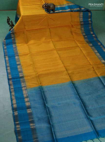 Pure soft silk saree mustard yellow and teal blue with allover zari weaves and rettapet zari woven border