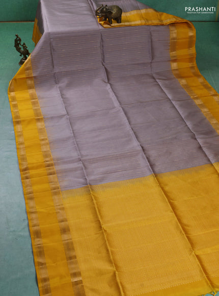 Pure soft silk saree grey and yellow with allover zari weaves and rettapet zari woven border