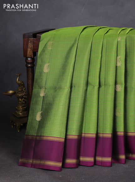 Pure soft silk saree green and purple with allover zari woven checks & buttas and rettapet zari woven border