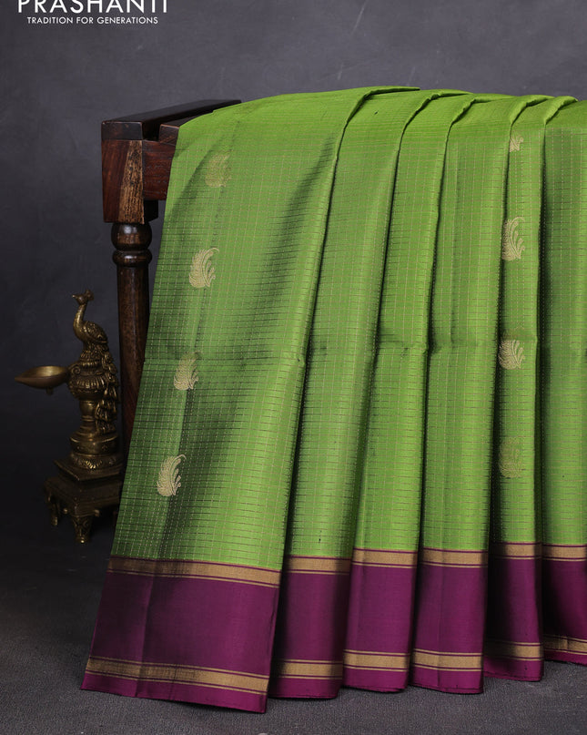 Pure soft silk saree green and purple with allover zari woven checks & buttas and rettapet zari woven border