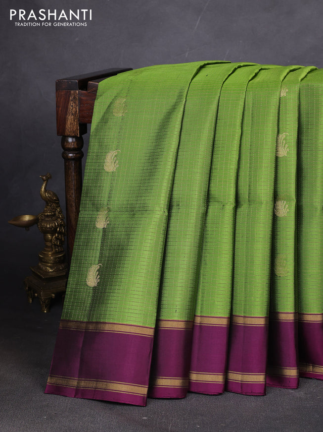 Pure soft silk saree green and purple with allover zari woven checks & buttas and rettapet zari woven border