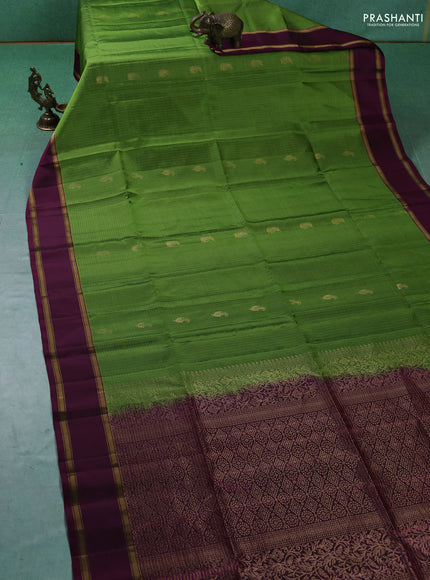 Pure soft silk saree green and purple with allover zari woven checks & buttas and rettapet zari woven border
