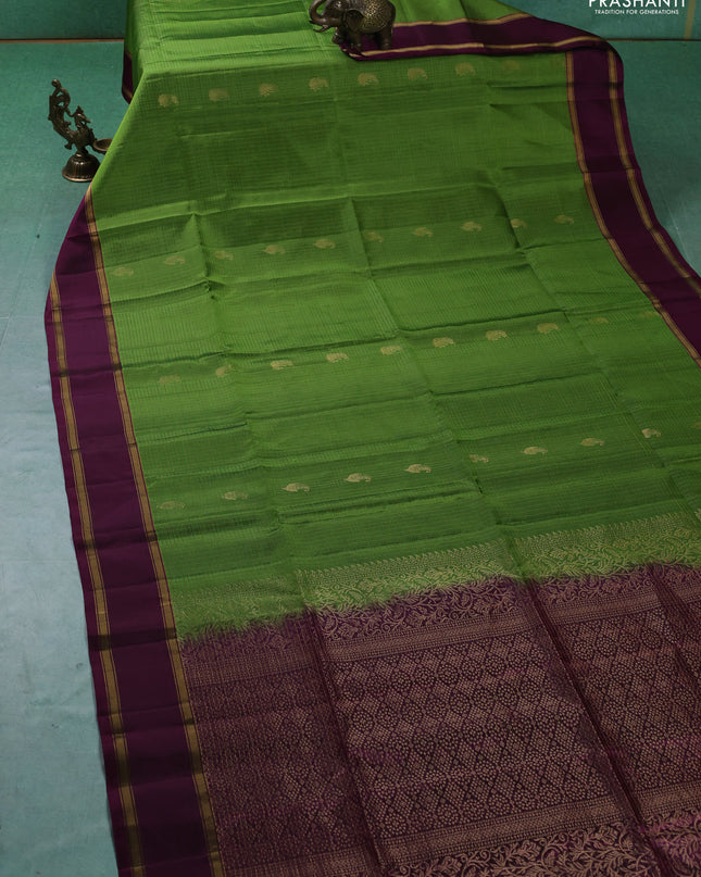Pure soft silk saree green and purple with allover zari woven checks & buttas and rettapet zari woven border