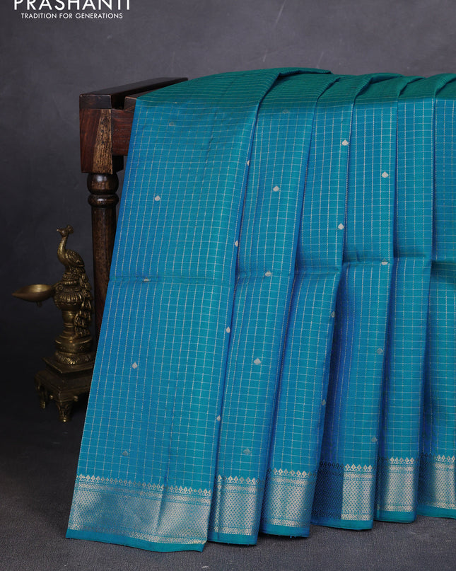 Pure soft silk saree teal blue with allover zari woven checks & buttas and zari woven border