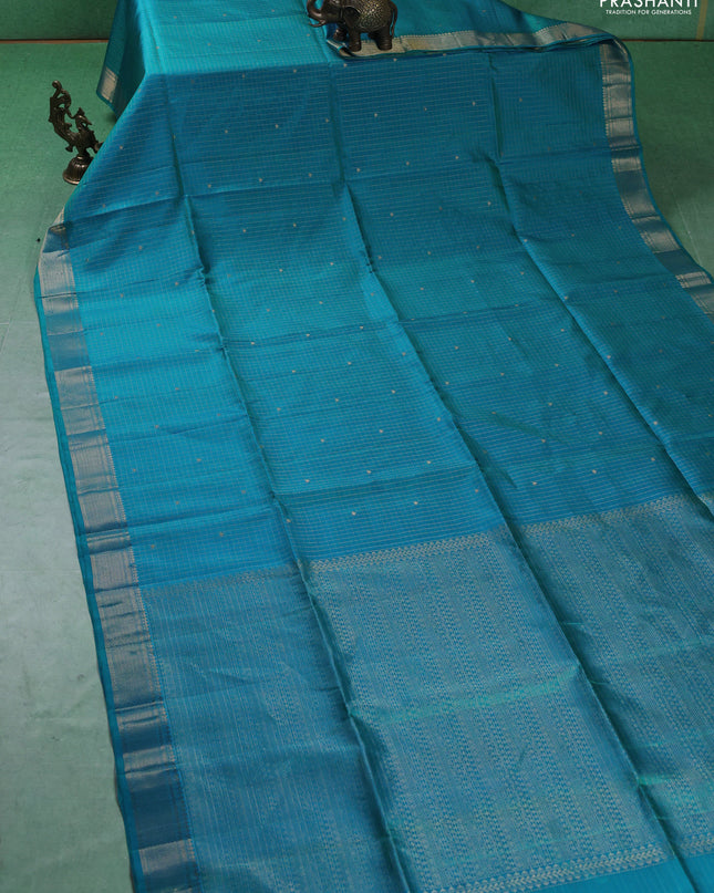 Pure soft silk saree teal blue with allover zari woven checks & buttas and zari woven border