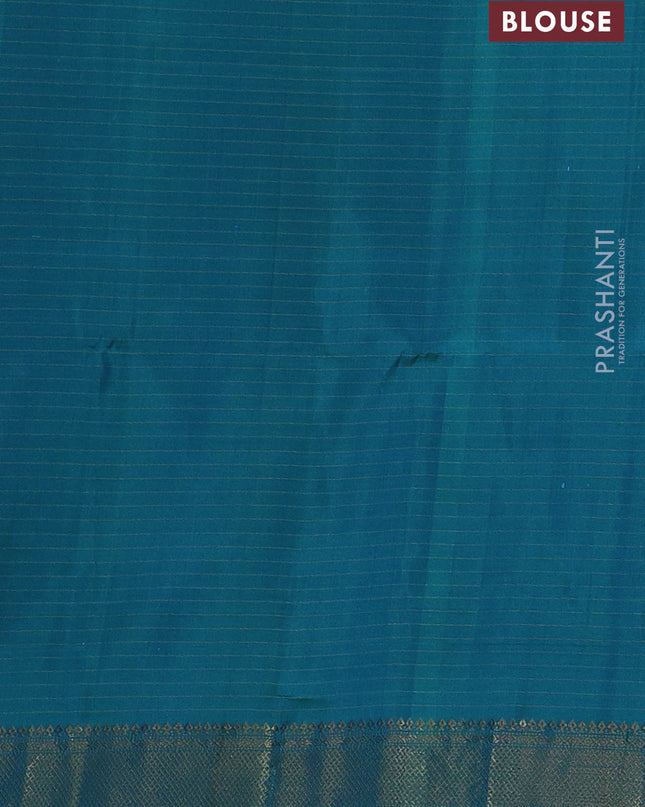 Pure soft silk saree teal blue with allover zari woven checks & buttas and zari woven border