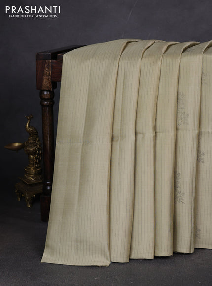 Pure soft silk saree cream and grey with allover stripes pattern & woven buttas in borderless style