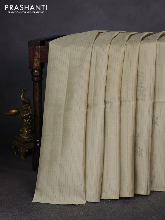 Pure soft silk saree cream and grey with allover stripes pattern & woven buttas in borderless style