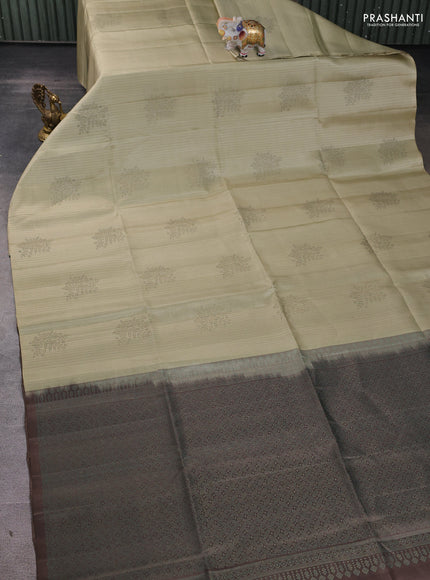 Pure soft silk saree cream and grey with allover stripes pattern & woven buttas in borderless style