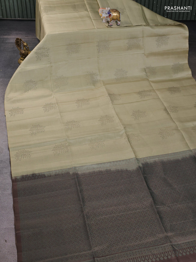 Pure soft silk saree cream and grey with allover stripes pattern & woven buttas in borderless style