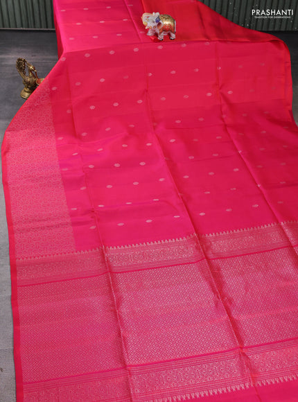 Pure soft silk saree dual shade of pinkish orange with silver zari woven buttas and rich silver zari woven border