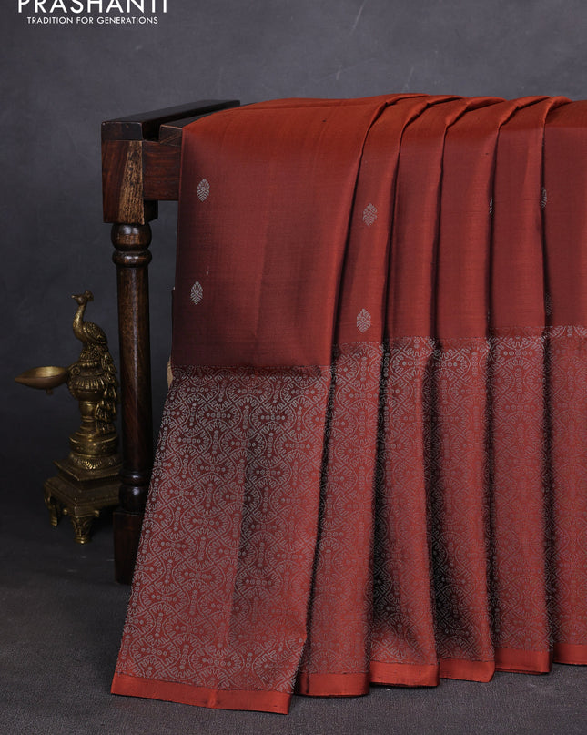 Pure soft silk saree rust shade with silver zari woven buttas and rich silver zari woven border