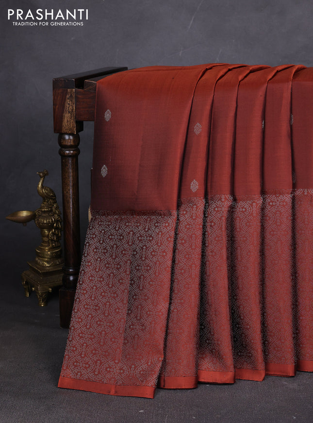 Pure soft silk saree rust shade with silver zari woven buttas and rich silver zari woven border