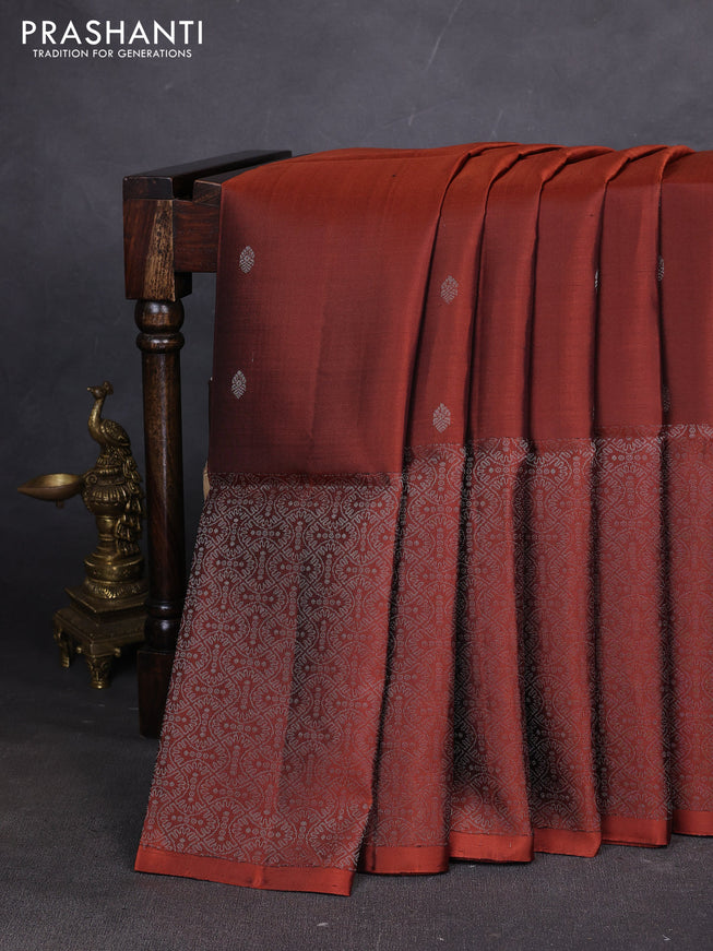 Pure soft silk saree rust shade with silver zari woven buttas and rich silver zari woven border