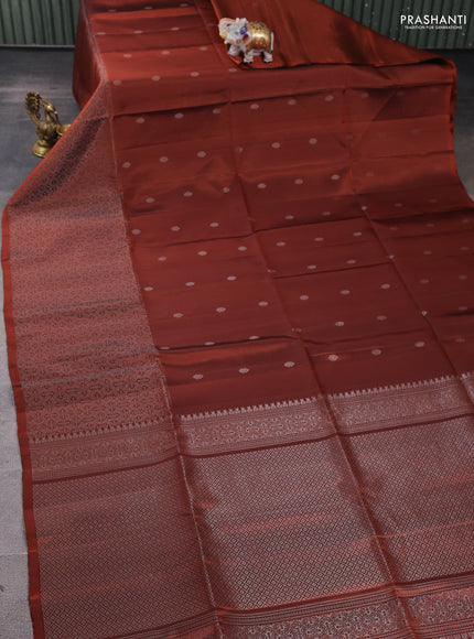 Pure soft silk saree rust shade with silver zari woven buttas and rich silver zari woven border