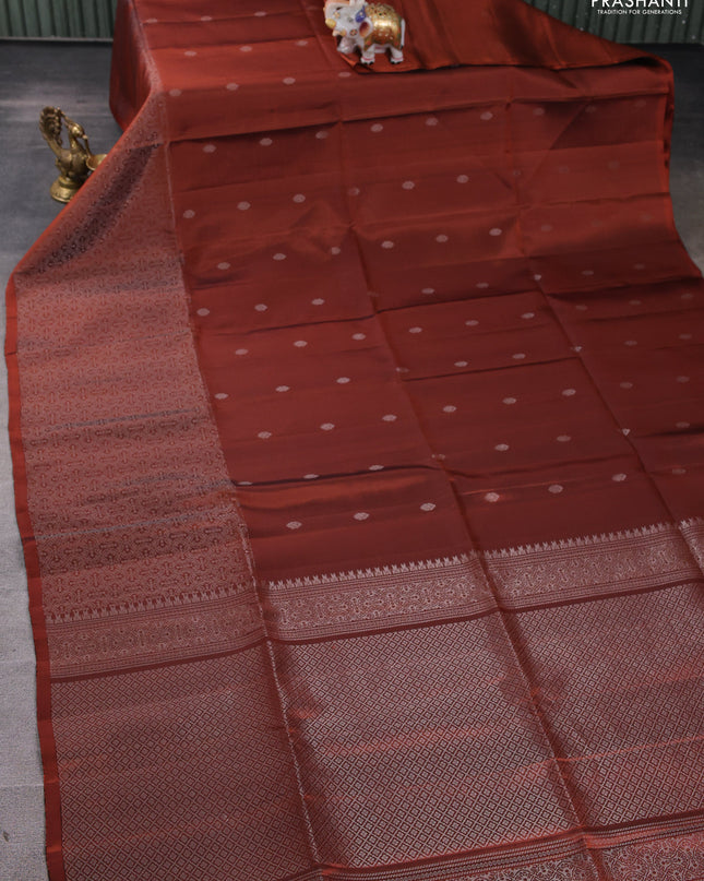 Pure soft silk saree rust shade with silver zari woven buttas and rich silver zari woven border
